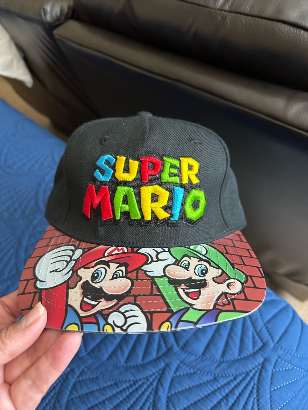 Nintendo Super Mario Black Cap with Colorful Embroidered Logo and Printed Brim
